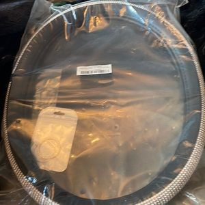 Diamond and leather studded steering wheel cover.